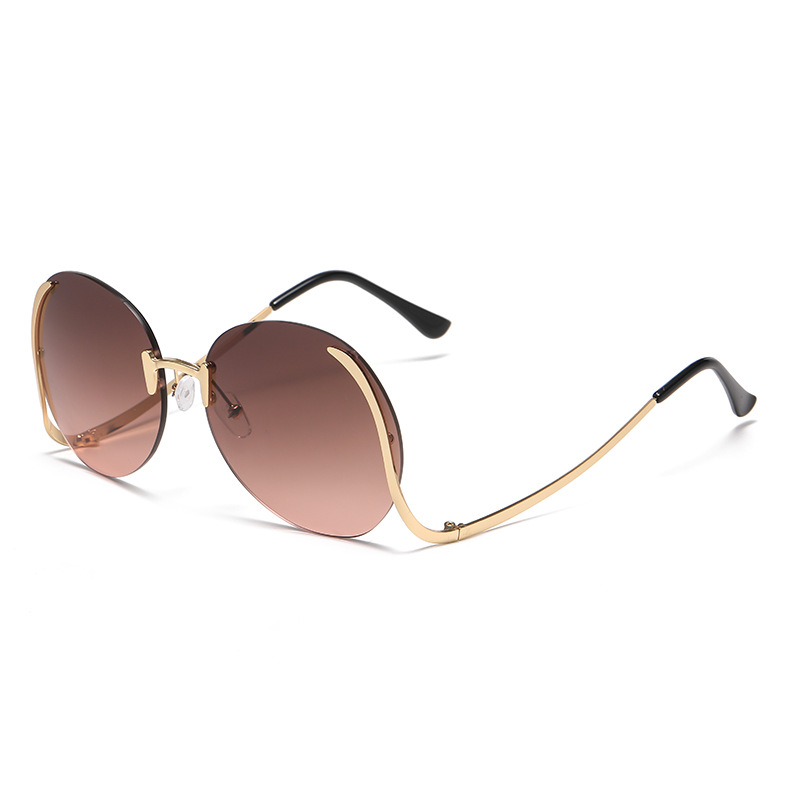 New cross-border frameless trimmed sunglasses for women, round lenses, European and American fashionable sunshade decorative sunglasses, UV-protective and sun protection fashionable and trendy women's sunglasses Item Picture