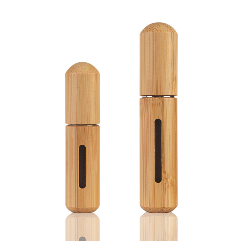 Creative bamboo and wood perfume direct filling bottles, 5ml, 8ml, with bamboo shells, bottom filling, self-pump spray filling bottles, portable travel filling bottles, eco-friendly press-type spray bottles Item Picture