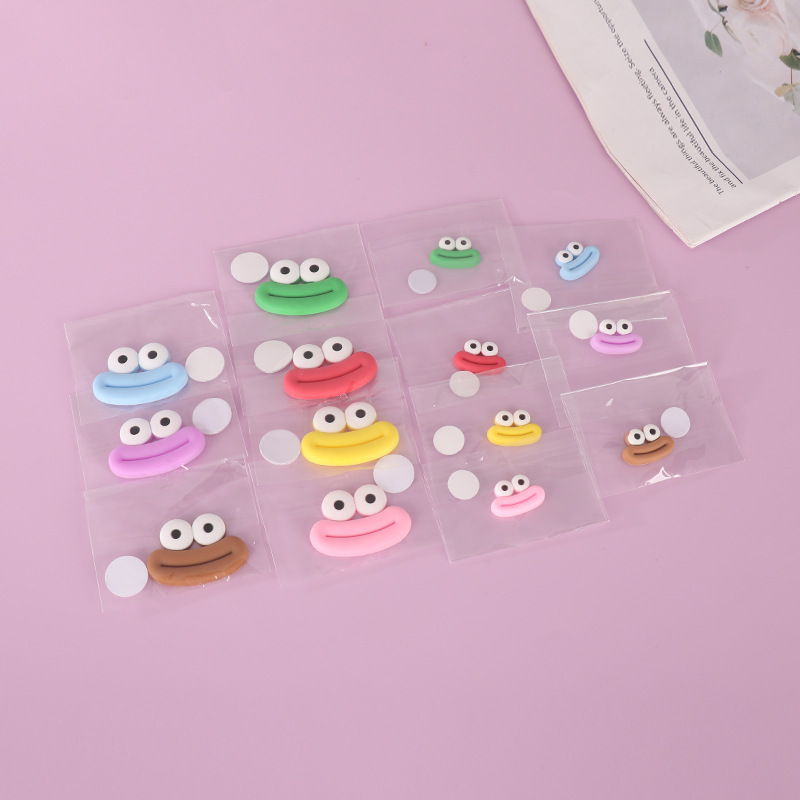Big eye cartoon sausage mouth eye charger protective case Mobile phone case diy creative soft adhesive patch accessories diy accessories soft adhesive anti-fall wear protective case Application Scenario