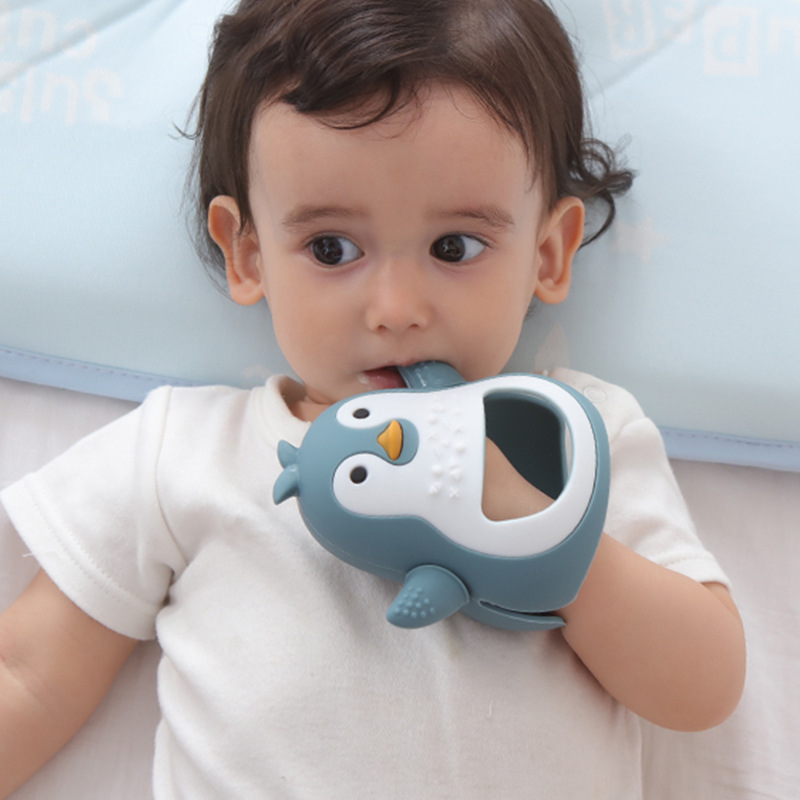 Amazon's new baby silicone teether stick comfort bracelet Penguin teether glove toy baby teether stick glove type teether grinder details Picture