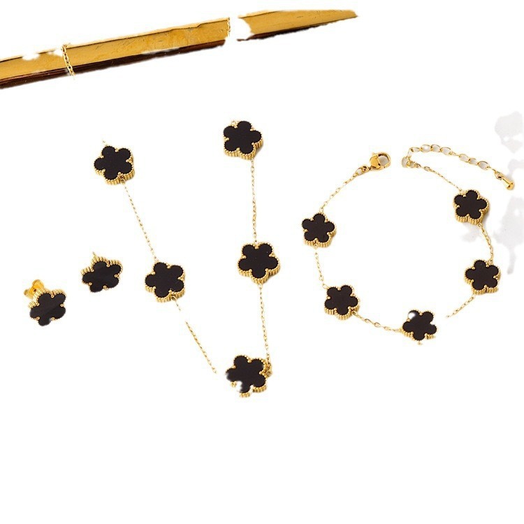 The girl's temperament is simple and individual, with a mature and elegant style. The five-leaf flower is a niche and retro titanium steel earrings, necklace, bracelet, set of earrings, and trendy earrings are all eye-catching and beautiful Item Picture