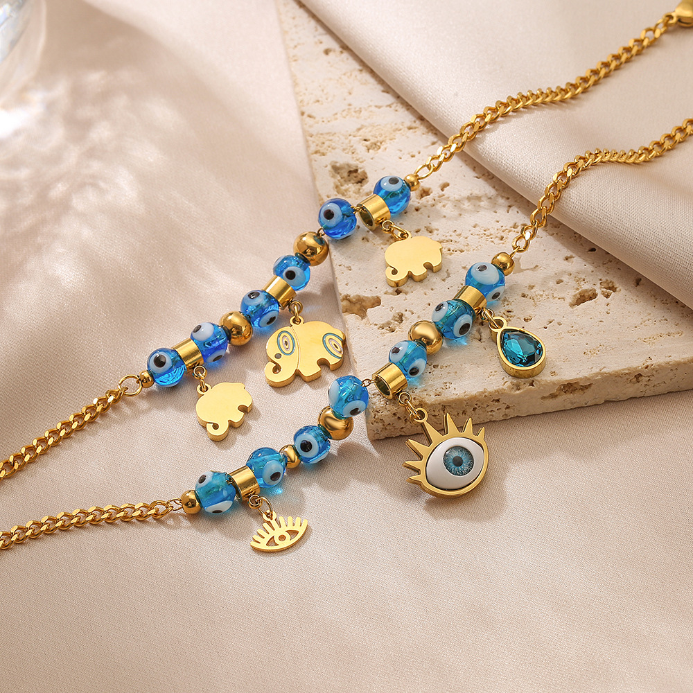 A new cross-border, niche and unique beaded devil's eye elephant pendant titanium steel bracelet for women on Instagram