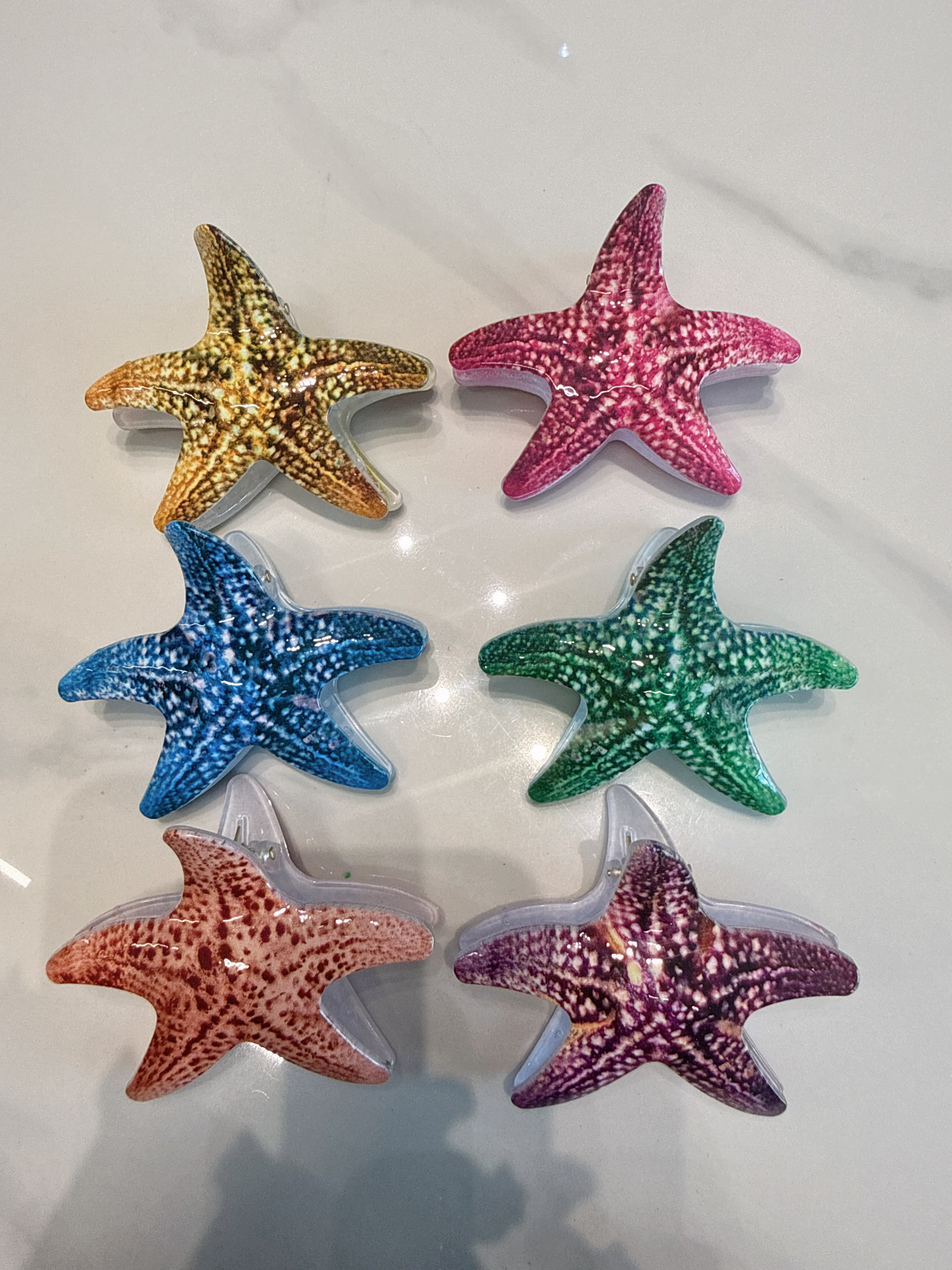 海星发抓，抓夹，海洋主题益智早教玩偶 仿真造型柔软安全爪子头饰品产品图