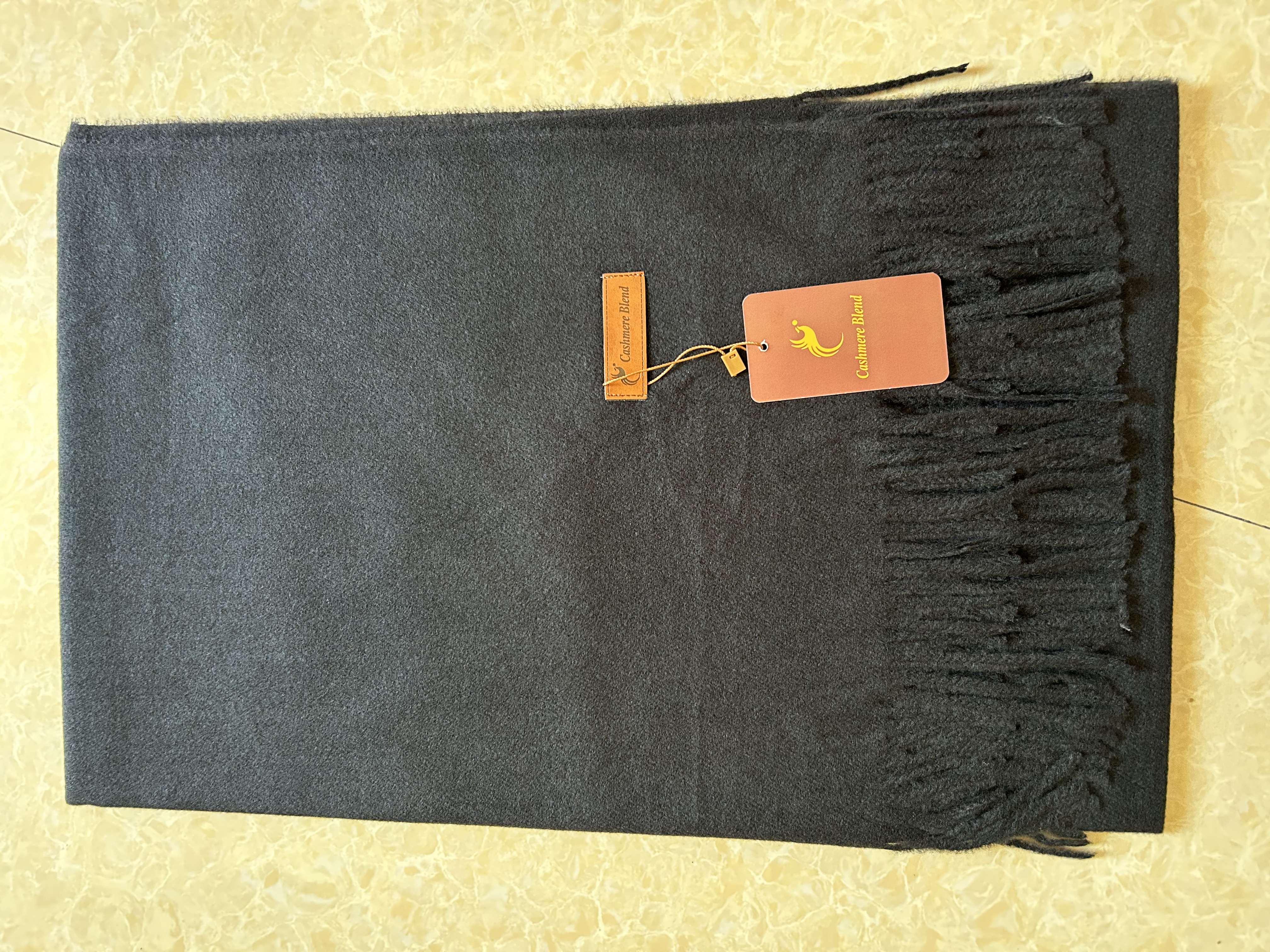 A thick and long faux cashmere scarf that is warm, fashionable and versatile for autumn and winter details Picture