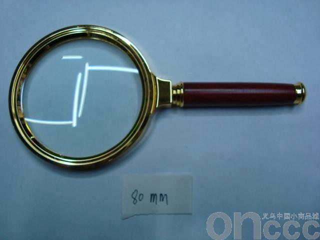 Gold-plated magnifying glass