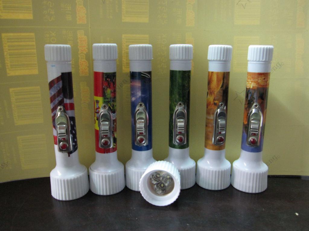 Pocket-sized plastic flashlight, Obama animal football star building, euro dollar printed export to Africa, 2AA battery Specification image