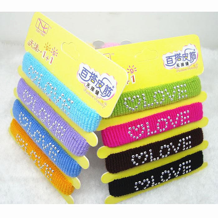 2元饰品批发.无接缝高弹烫字母皮筋8卡一包