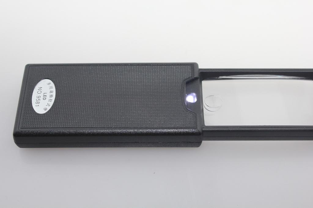 供应新款 9581双镜片放大镜 带灯 验钞 抽拉放大镜