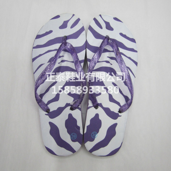 Purple zebra-patterned ladies' slippers are available