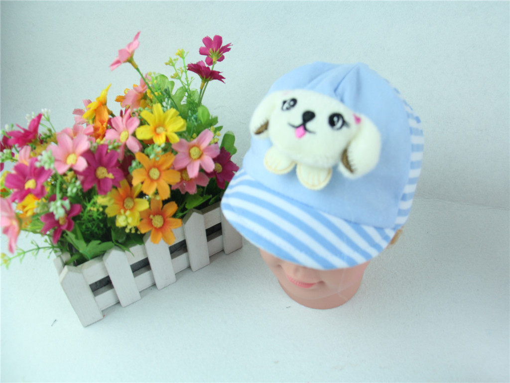 A baby hat has a brim. A baby hat has a soft brim