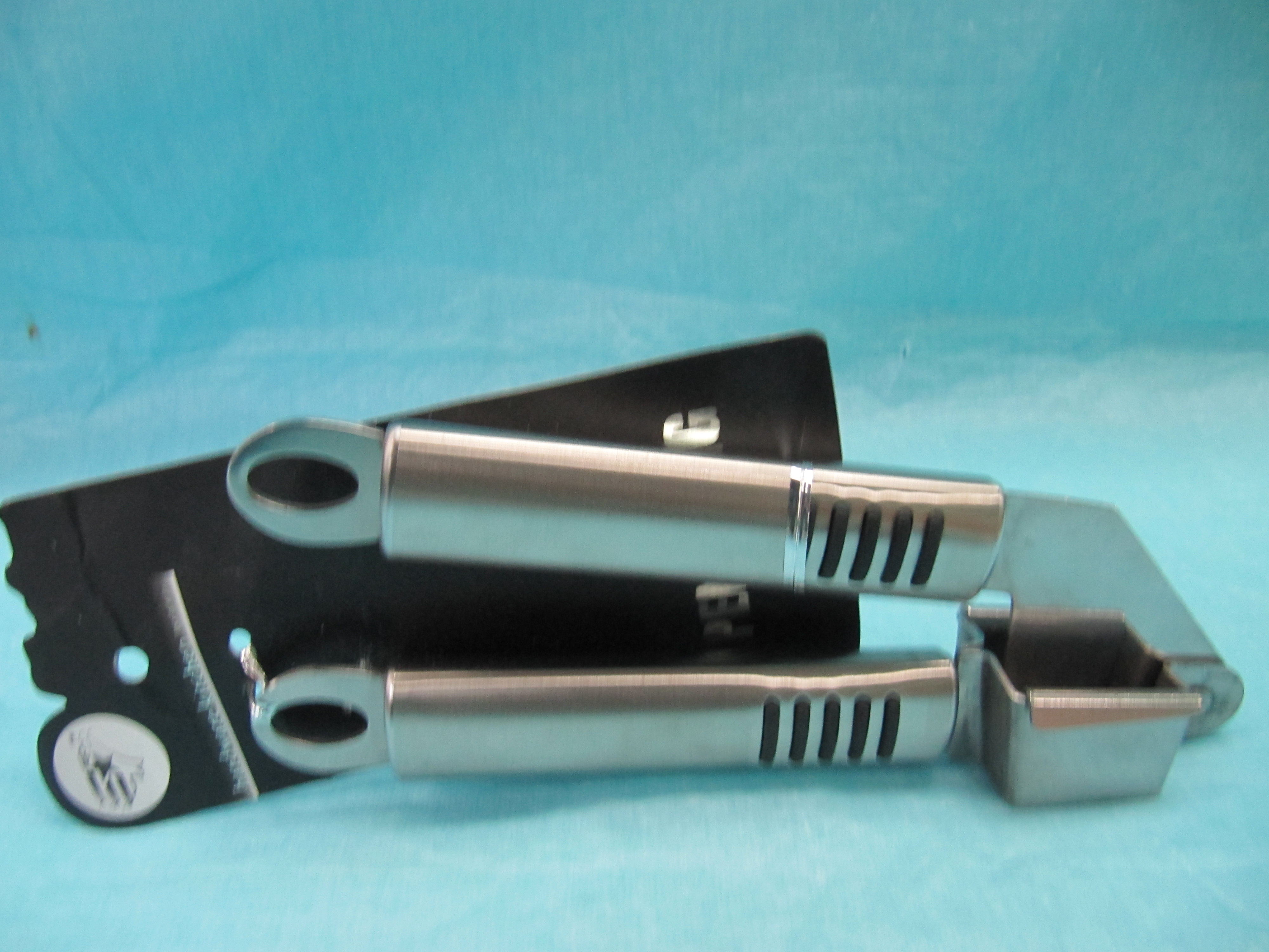 Rubber and plastic garlic press with steel handle