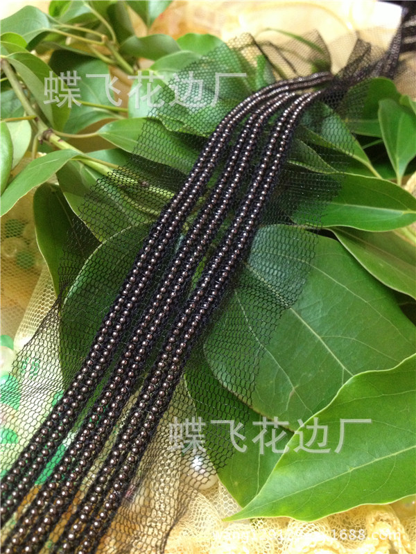 Iron and copper chain details on customized garments