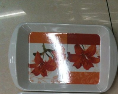 Stacked colorful small trays showing space-saving design