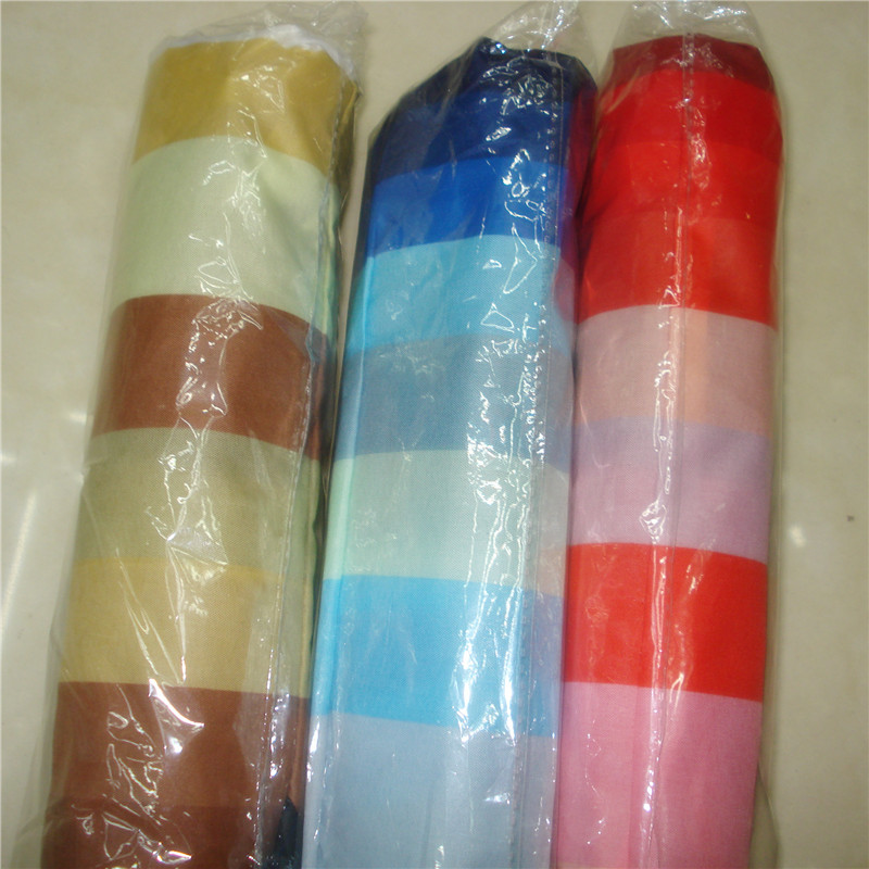 Fresh striped umbrella, four-color striped contrasting three-fold umbrella, creative folding umbrella Application Scenario