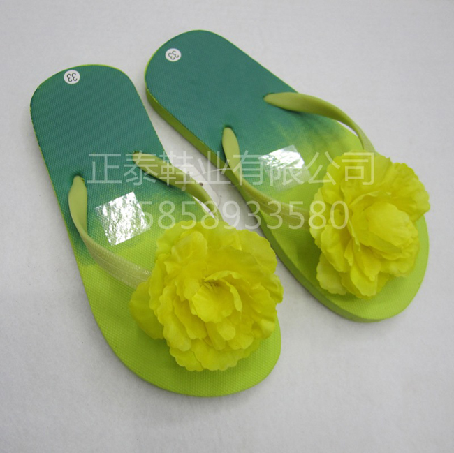 Wholesale of custom-made yellow flower-adorned EVA flip-flops for women