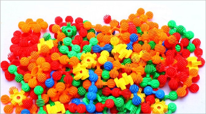 供应幼儿园益智早教桌面塑料积木玩具小太阳花拼插