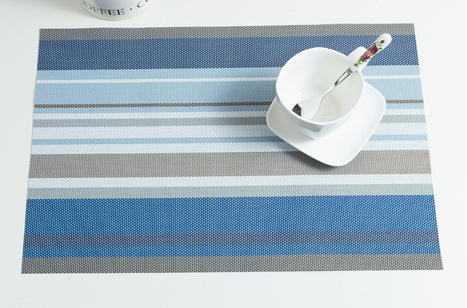 The hotel placemats are blue striped