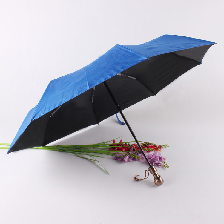 Wholesale and customization of high-quality black rubber tap-up fabric fully automatic umbrella skull head UV protection umbrella
