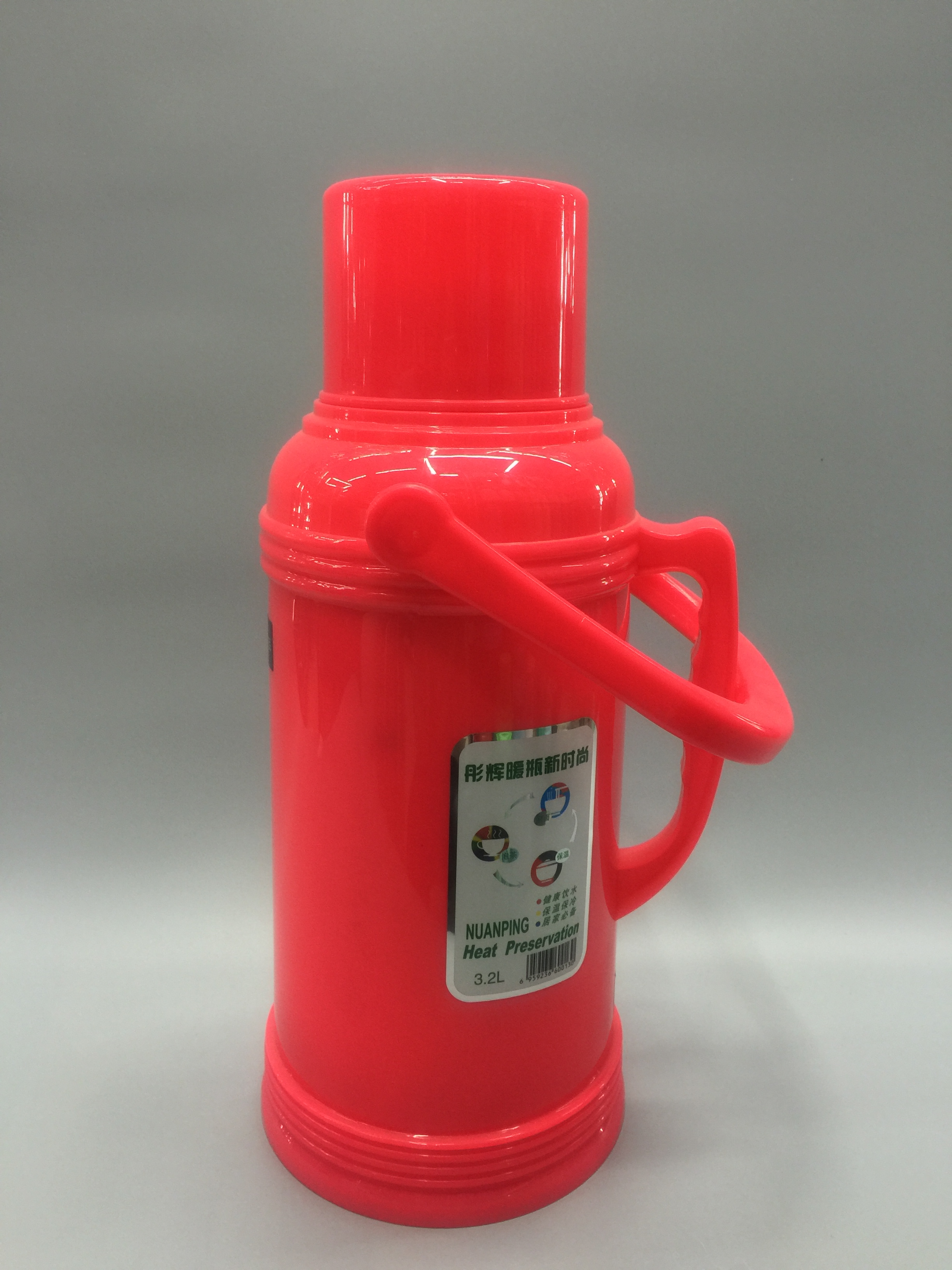 A household old-fashioned wooden stopper thermos with a glass inner liner