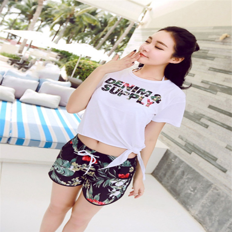Korean beach vacation green leaf and red flower casual couple beach pants, men's and women's couple outfits sea details Picture