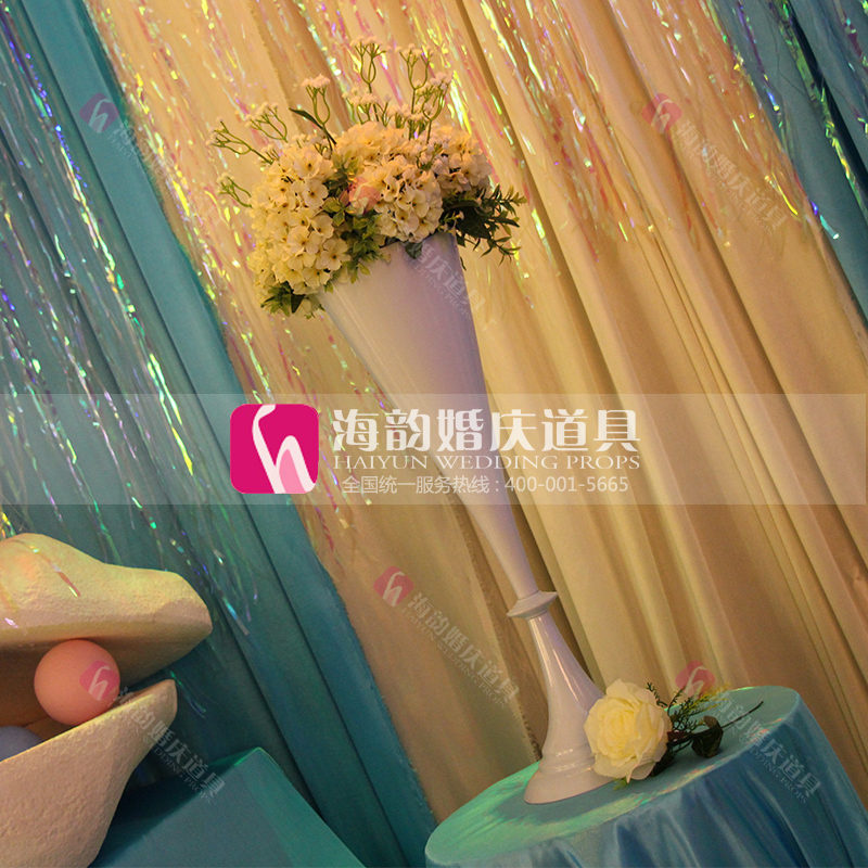 Yiwu Haohuo Haiyun Wedding Products Co., Ltd. offers wedding decoration items, ironwork trumpets and vases