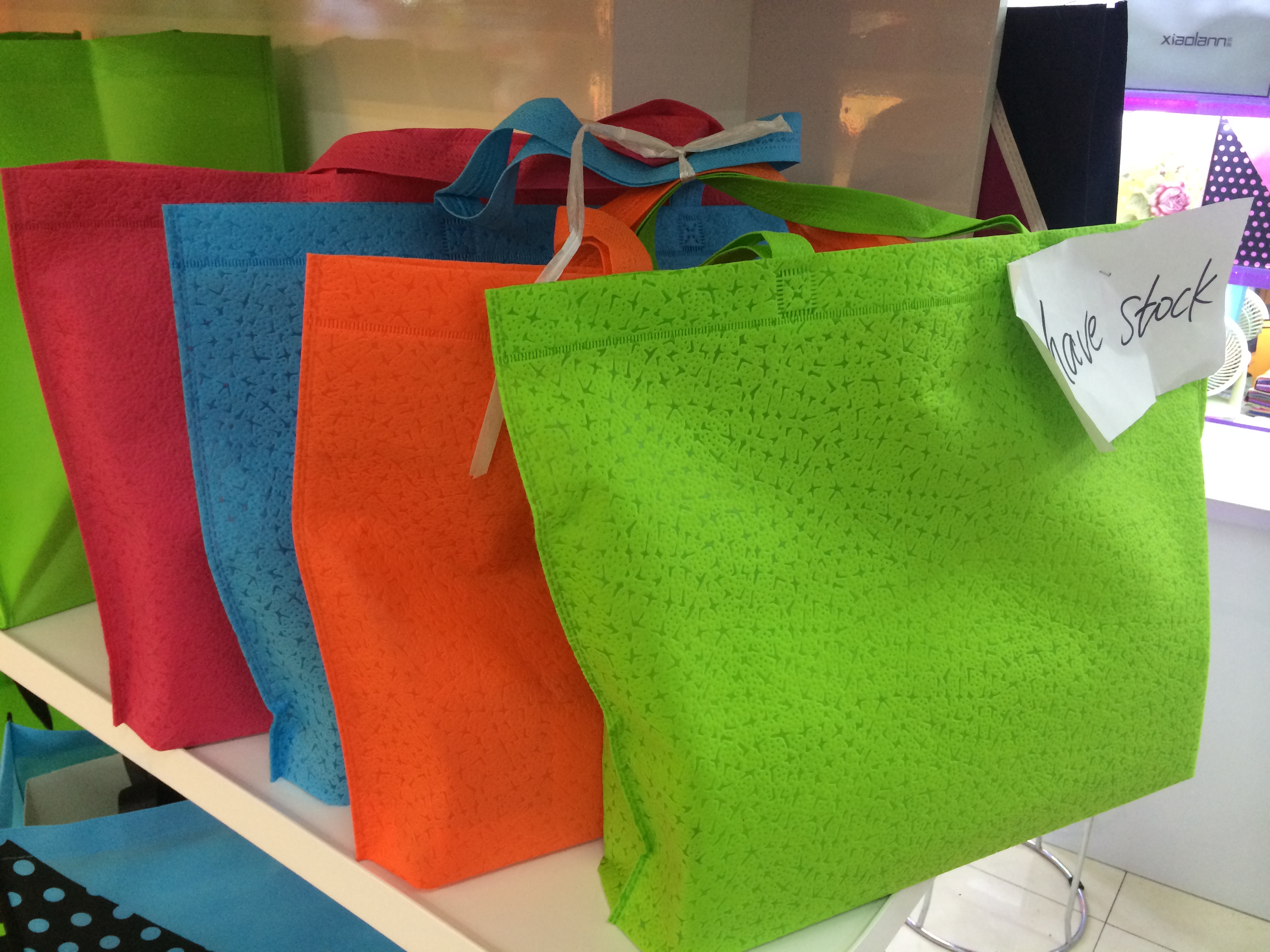 Non-woven fabric embossed handbags in stock