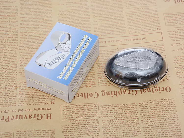 Yiwu Jinghui Wholesale metal 9890 high-power jewelry identification magnifying glass 40 times 25mmLED lamp UV violet light can be verified
