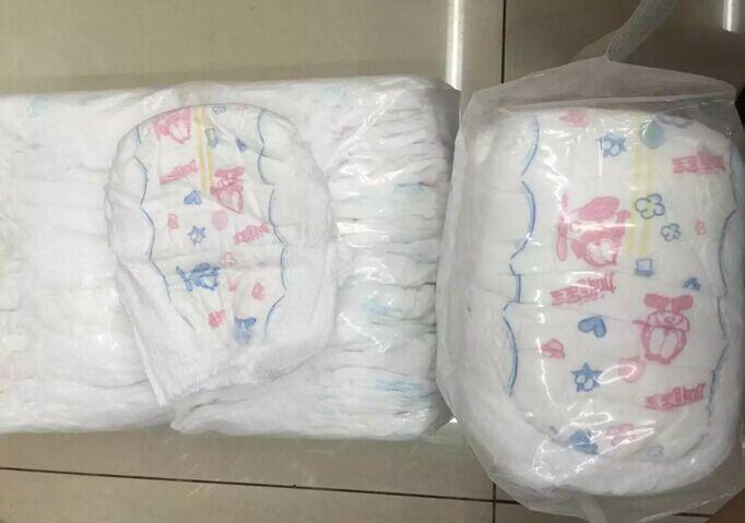 外贸尾货 2等品的 拉拉裤 纸尿裤 透明白袋装 50片一包细节图