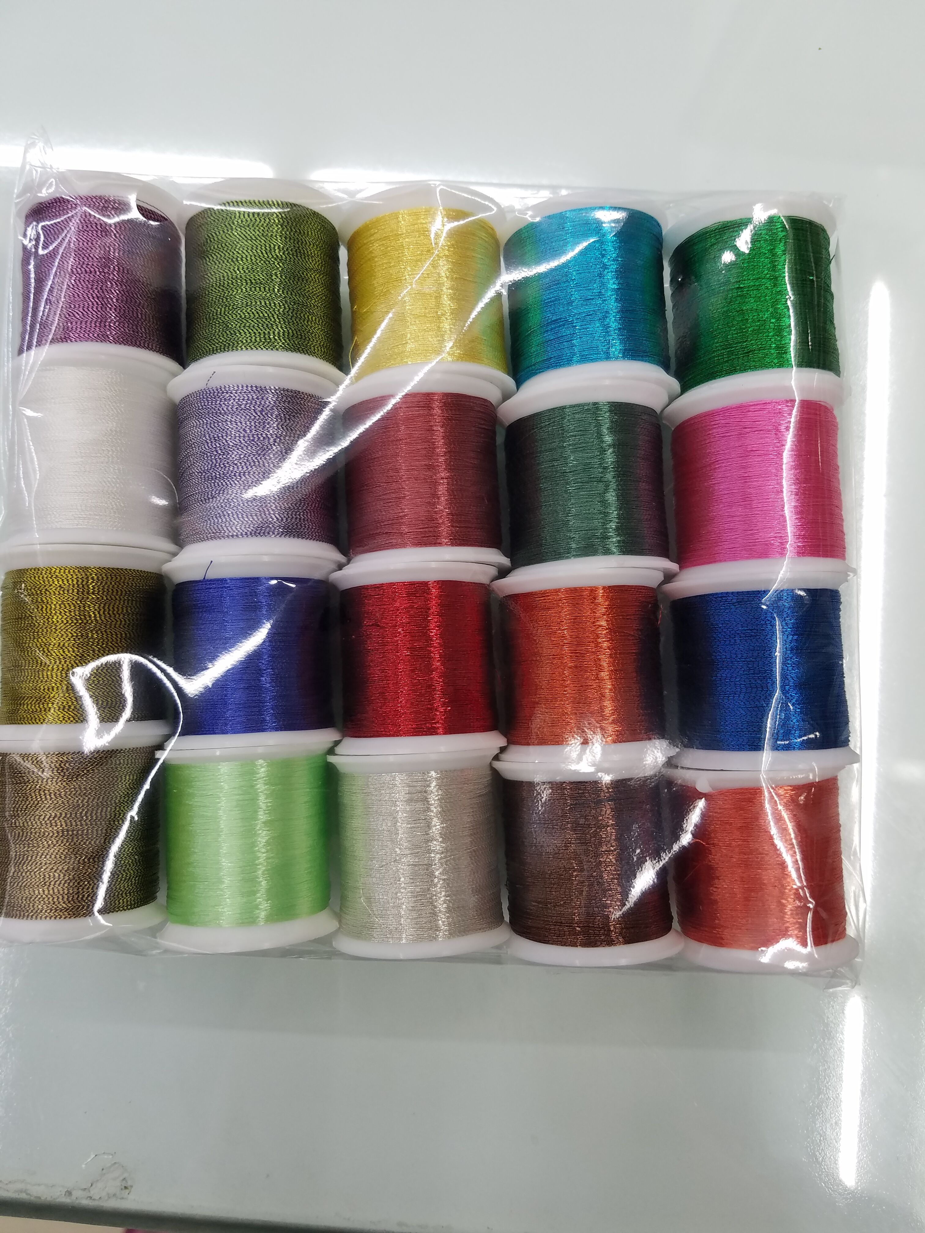 Mini packaging with multiple colors of gold and silver threads