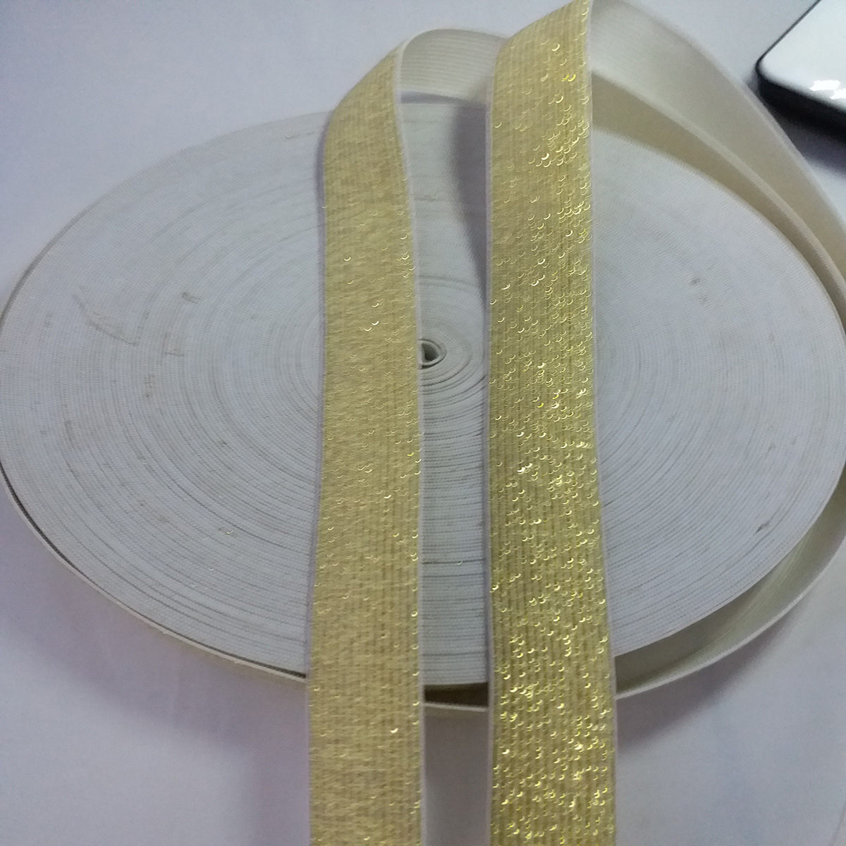 Polyester elastic, nylon elastic, etc.