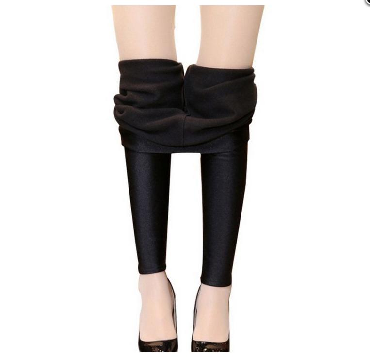 Fleece leggings are worn over women's fatten and oversized warm pants, nylon fleece glossy pants, and skinny pants