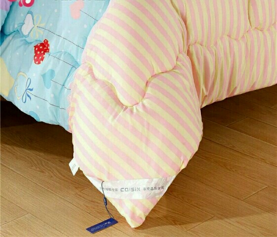 Winter quilt used as a throw on a living room sofa