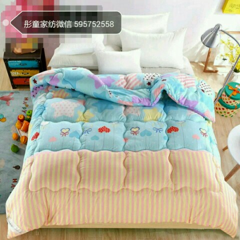 Beautifully printed winter quilt on a modern bed setting