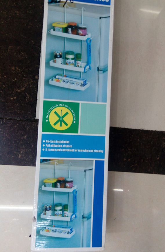 The multi-functional hanging rack TVSssemblb drawin is hung behind the door details Picture
