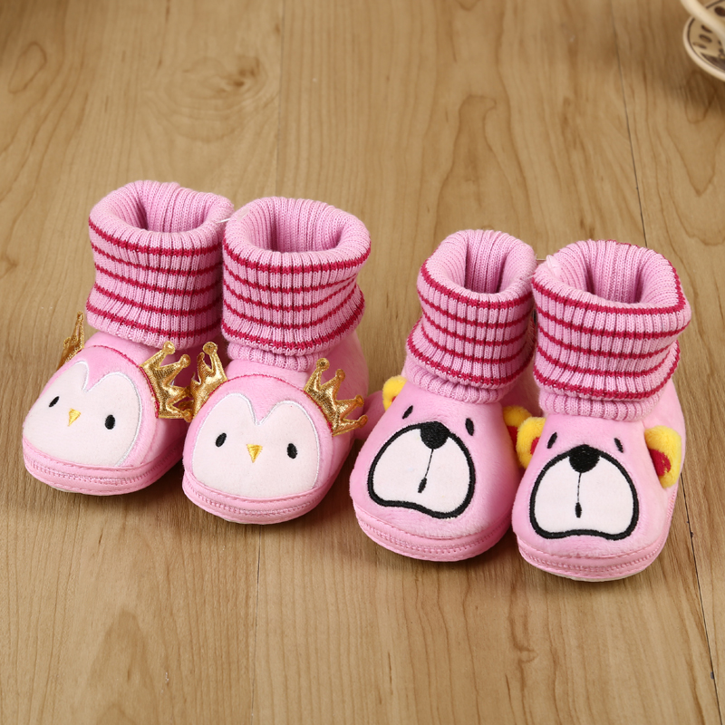 Warm toddler shoes with quilted cuffs and soft soles