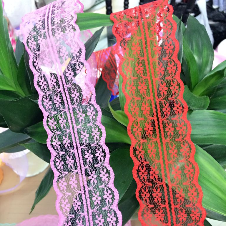 Direct sales from the manufacturer of non-elastic multi-color lace trim, with stock available for immediate supply
