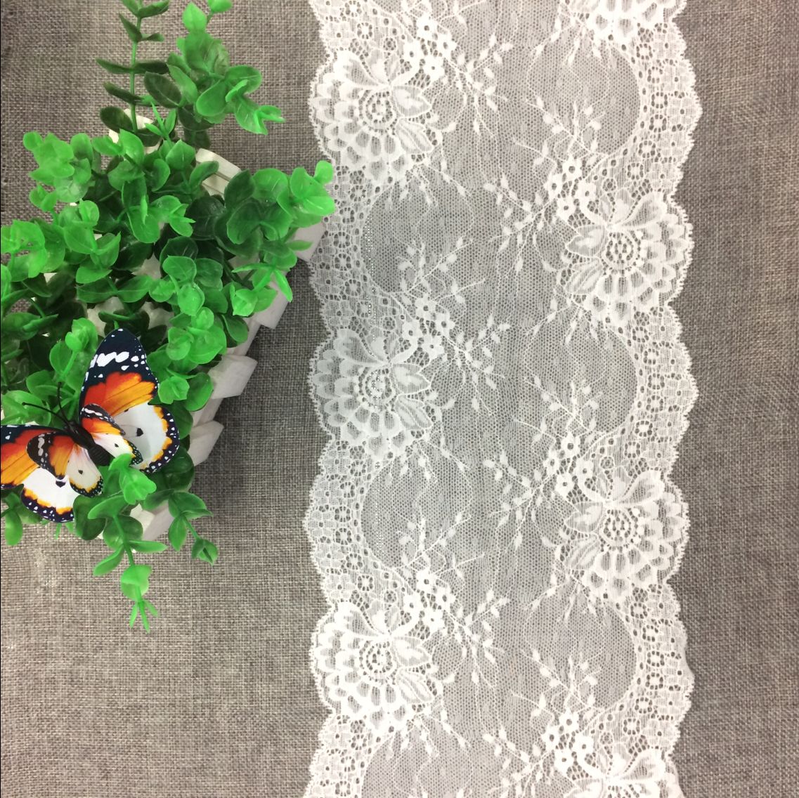 A best-selling base layer shirt with elastic brocade and ammonia lace trim Specification image