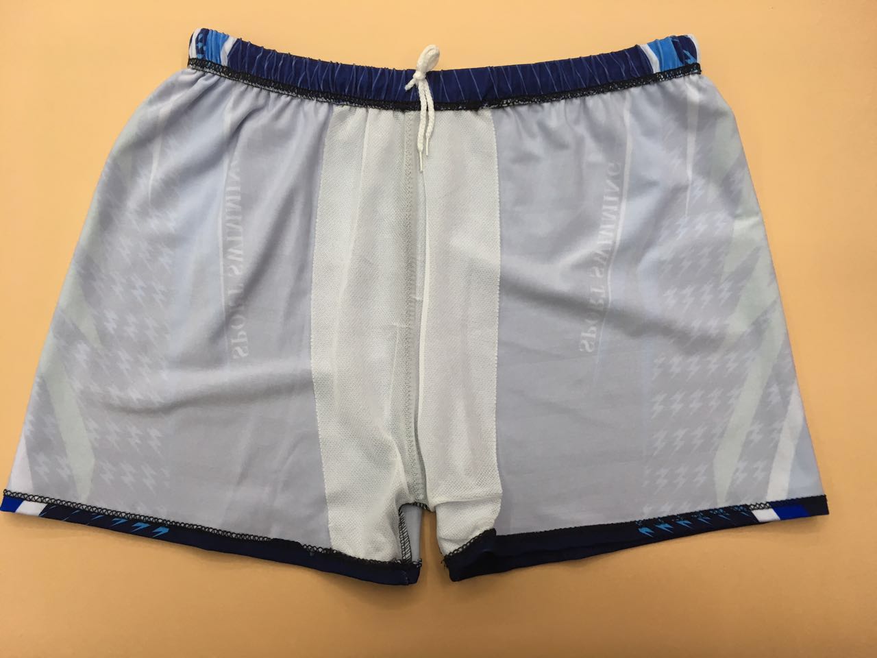 Men's swimming trunks Large size swimming trunks Flat corner hot spring fashion disposable printed milk silk flower swimming trunks Specification drawing