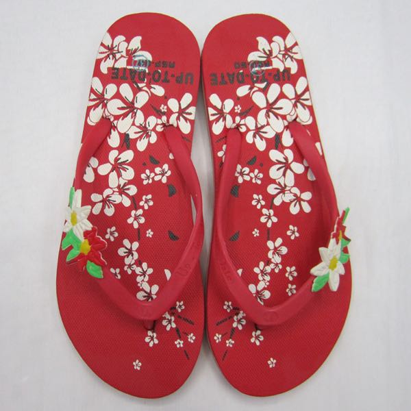 Red flower-shaped women's flip-flops beach slippers are available