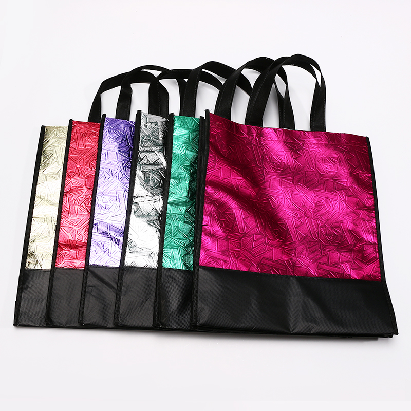 Non-woven bag custom aluminum foil stitching women's clothing handbag environmental protection gift bag printing advertising bag thumbnail