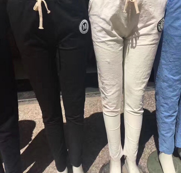 跑江湖地摊集市热卖女式水洗亚麻休闲贴布打底裤产品图