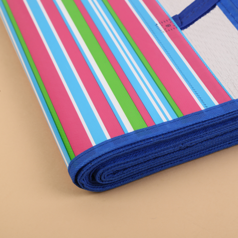 Factory direct sales of grass silk silver light film material leisure beach MATS Application Scenario