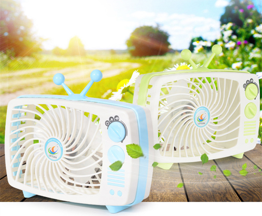 New retro TV fan Charging Mini Handheld Strong Wind fan Creative desktop small fan Application Scenario
