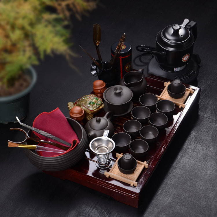 A complete set of Yixing purple clay tea sets, Gongfu gift sets, electric water boilers, tea trays and tea sets details Picture