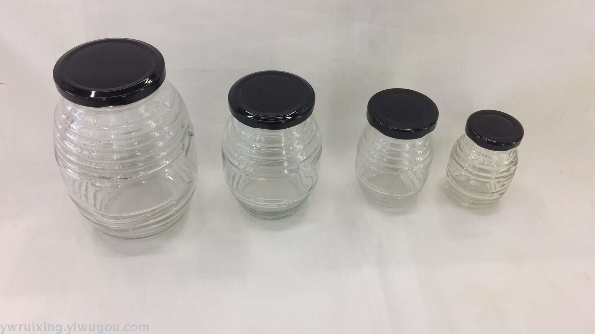 Honey spiral glass bottle