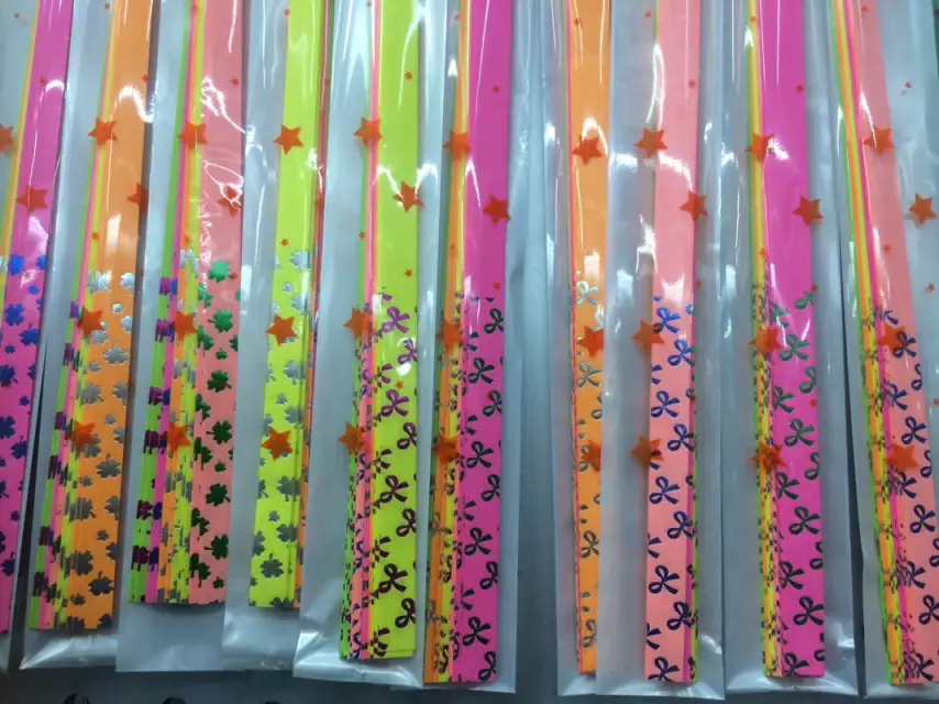 Fluorescent gold-embossed mixed-color star bars