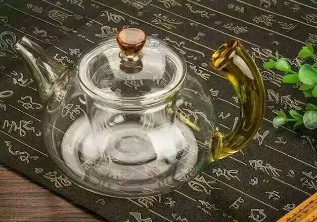 Use A Teapot With A Glass Open Flame