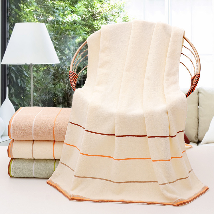 Direct sales of pure cotton bath towels from Yiwu factory, thickened 32-strand adult three-segment bath towels, daily necessities and household bath towels details Picture