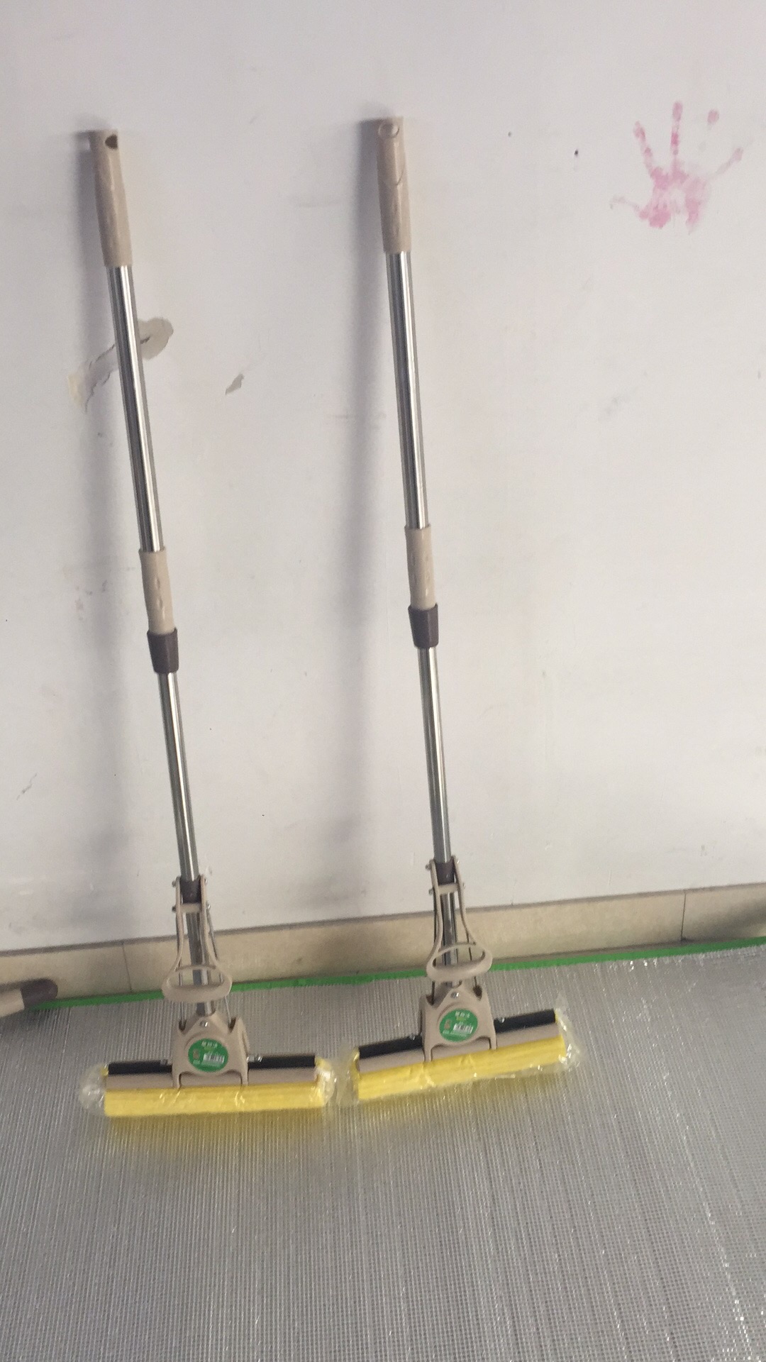 Factory direct sales of stainless steel expansion and contraction, 27 cm plastic thickened mop with rubber cotton