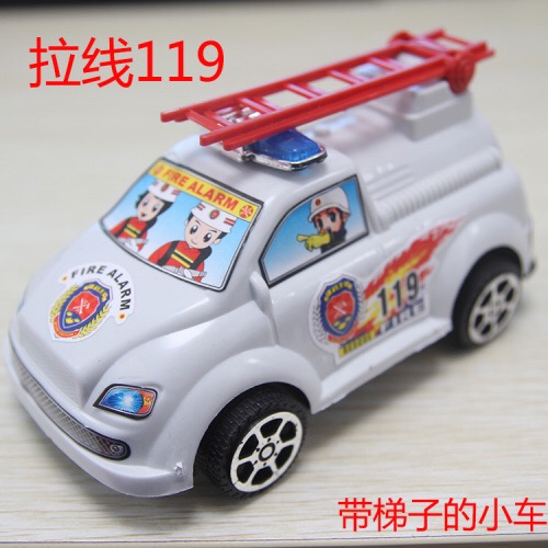 A fire engine with a pull wire, toys at a street stall
